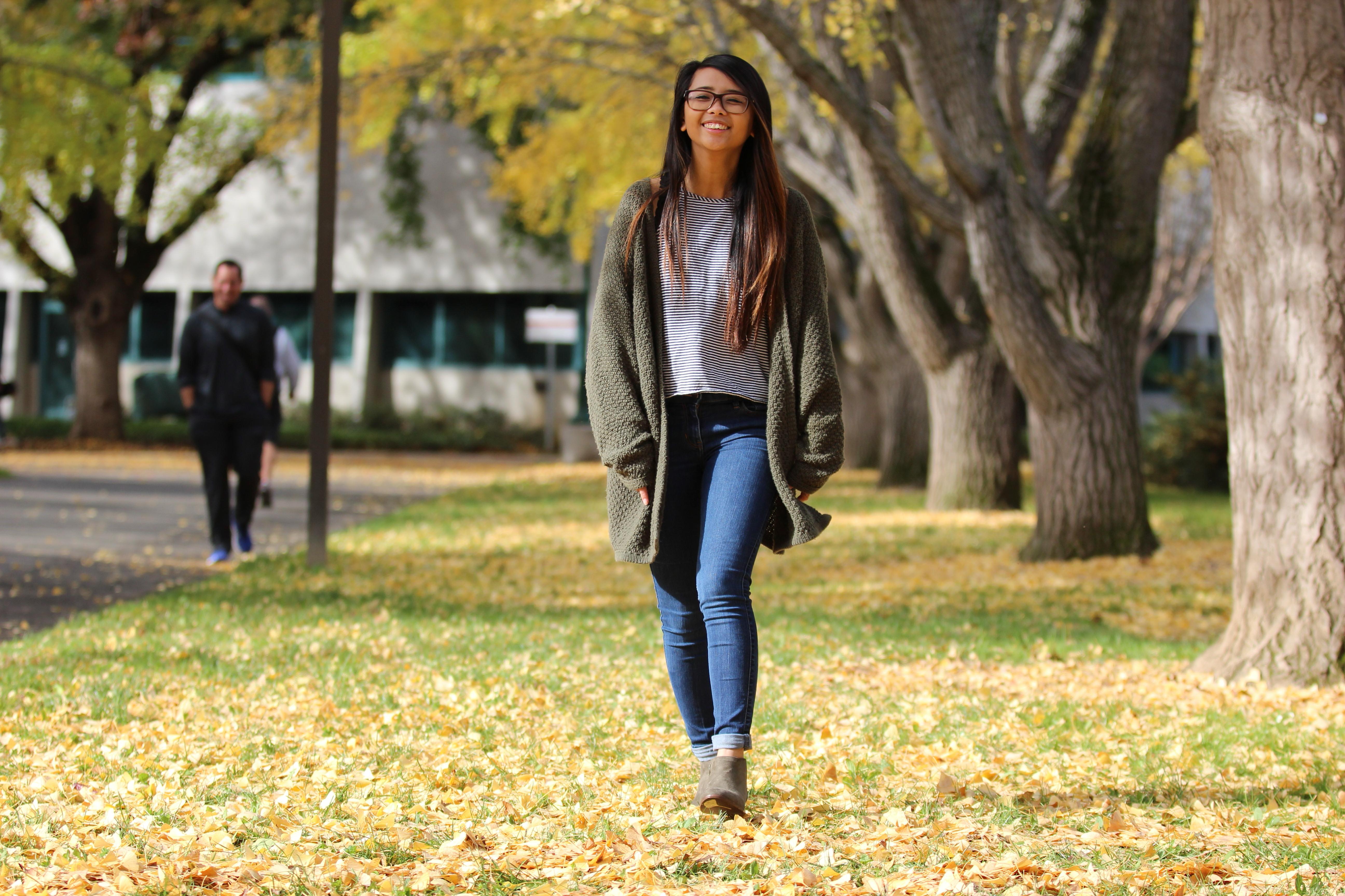 photo of student walking on campus